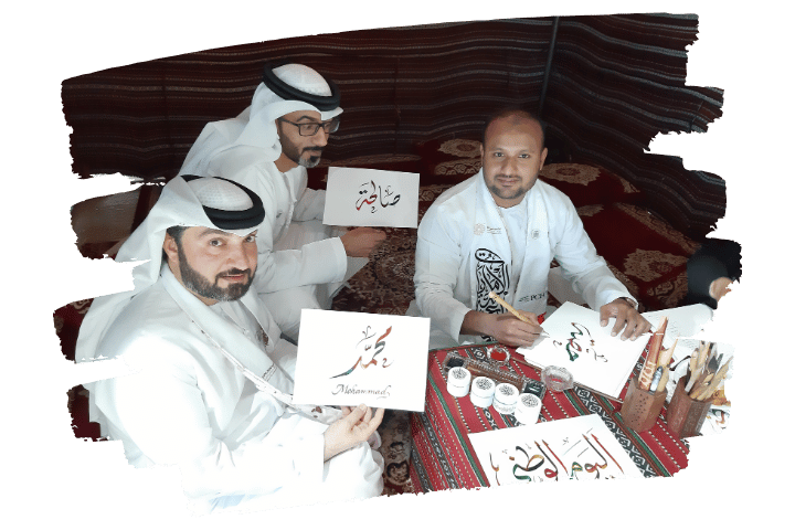 mohammed muneer performing calligraphy art at a live event